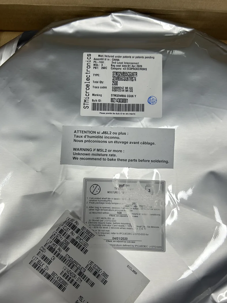 STM32WB55CGU6TR sealed anti-static bag stock photo
